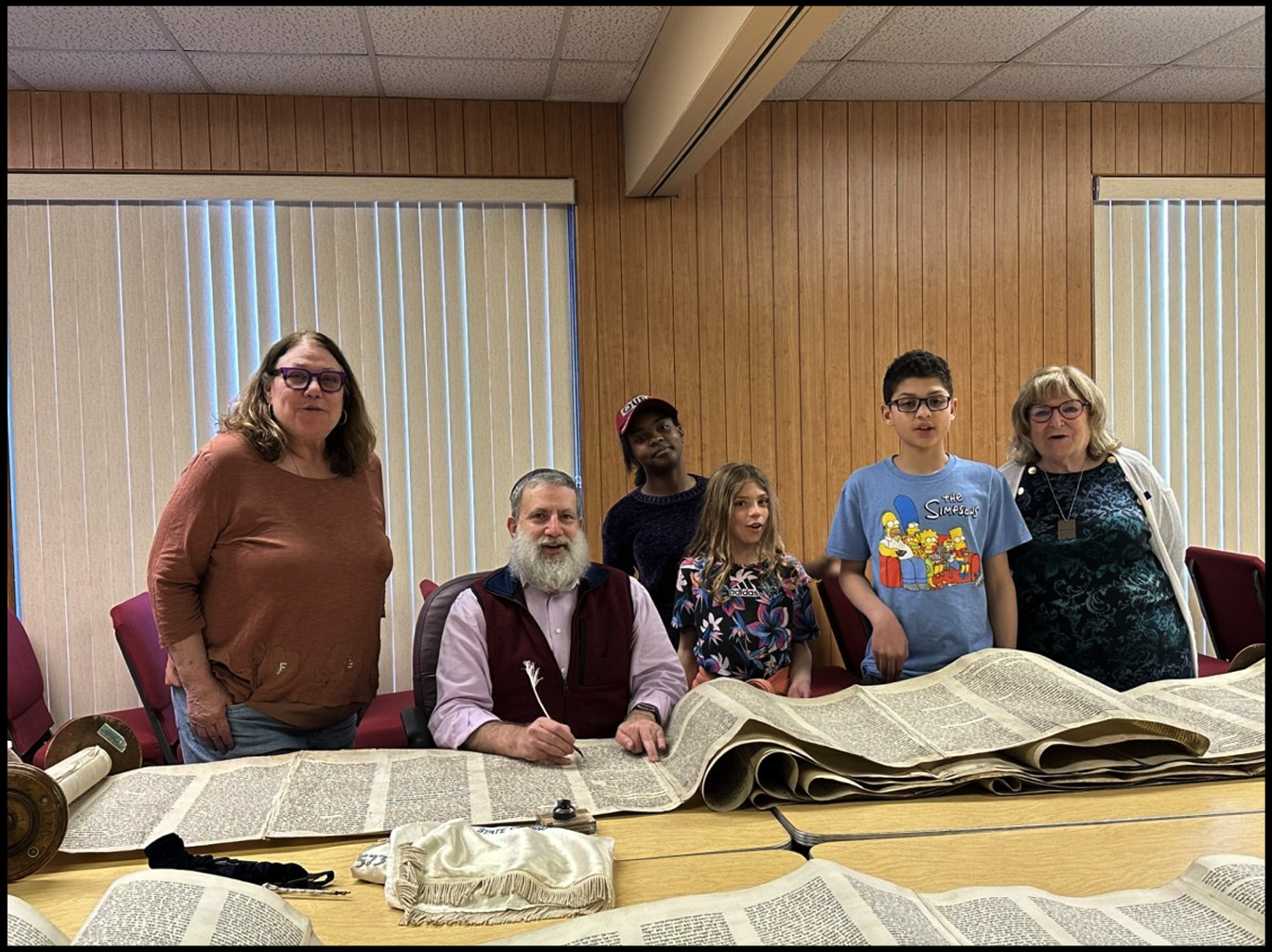 “Sofer On Site” from Miami, FL came to inspect and repair several torahs for Shir Tikvah. The Hebrew School students were able to go back and observe the process as Rabbi Druin was working.